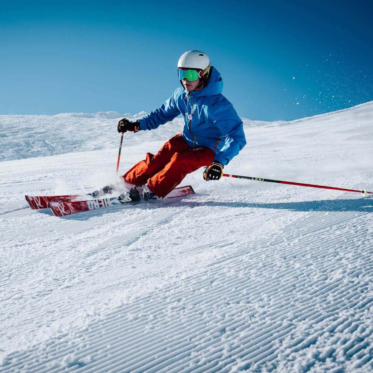 Person skiing down a snowy slope.