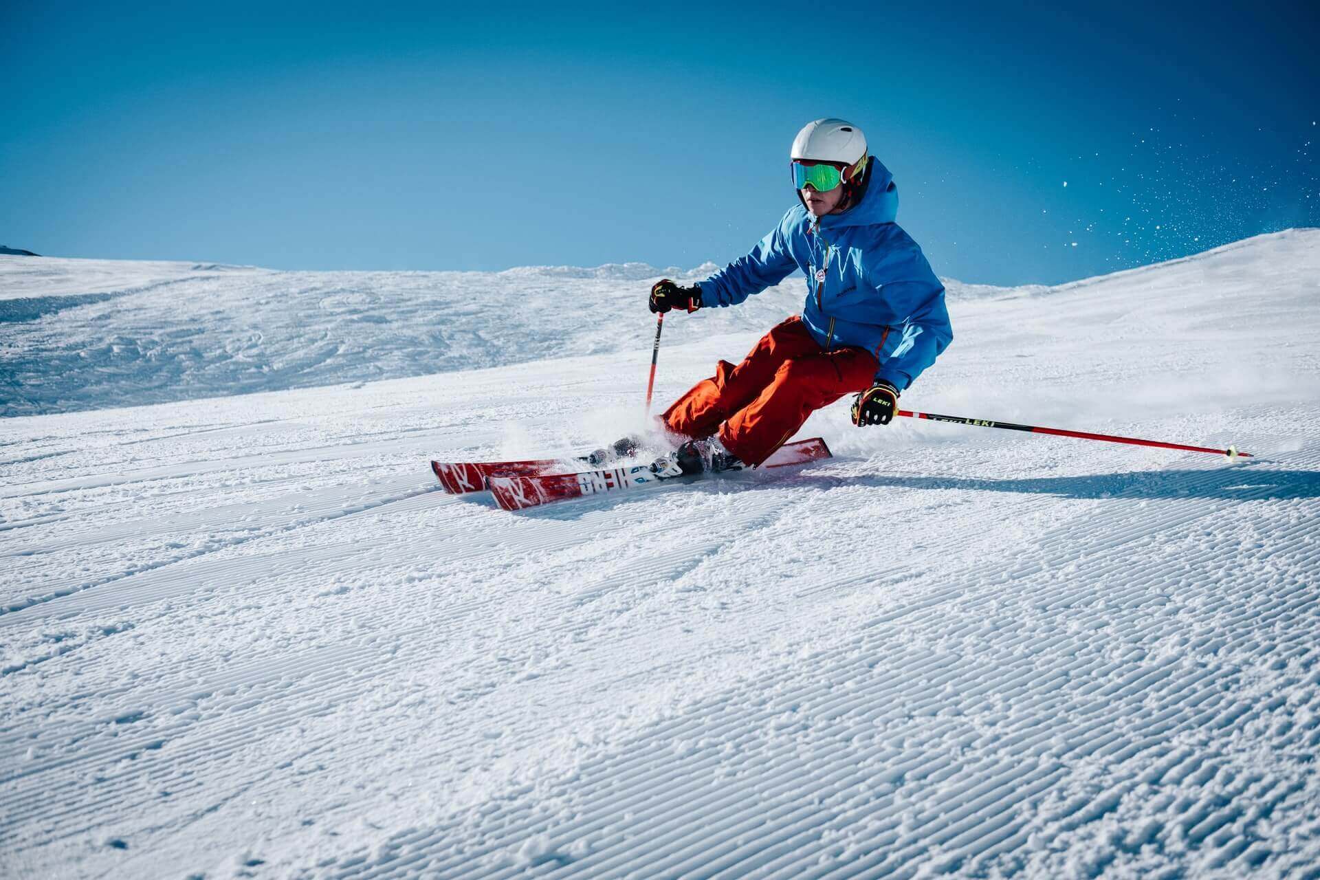 Person skiing down a snowy slope.