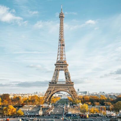 The Eiffel Tower in Paris, France, standing tall against the sky.