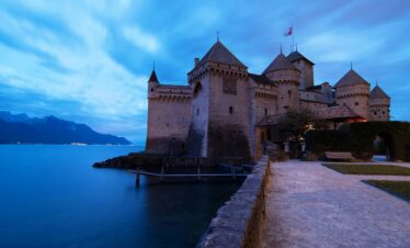 Chillon Castle on the shores of Lake Geneva, with its medieval towers and picturesque surroundings.