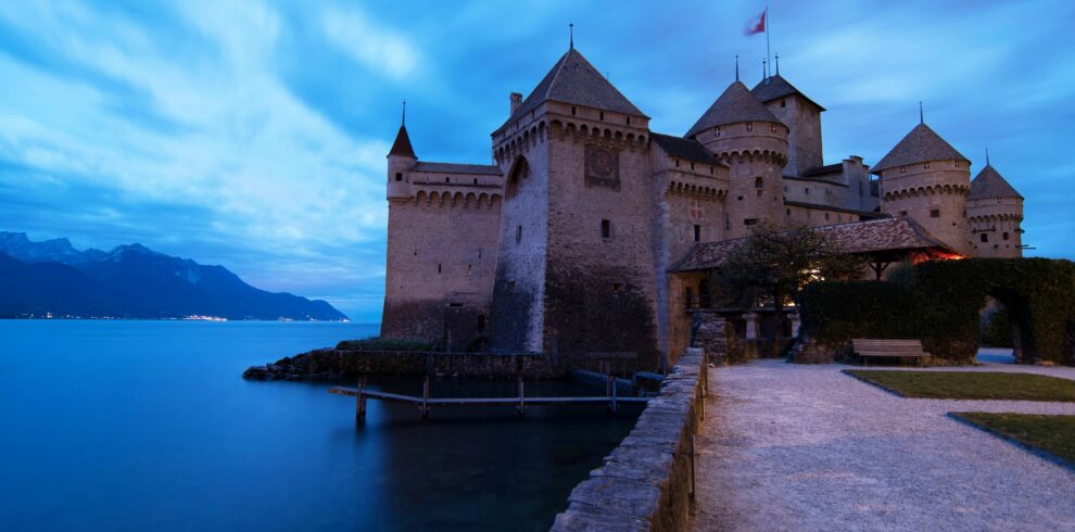 Chillon Castle on the shores of Lake Geneva, with its medieval towers and picturesque surroundings.