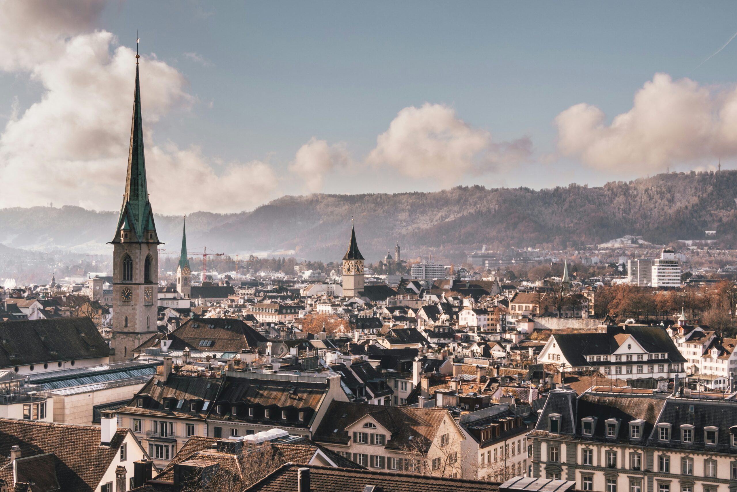 View of Zurich's Old Town with narrow cobblestone streets, historic buildings, and medieval architecture.